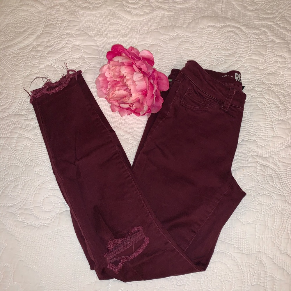 Burgundy Distressed Skinny Jeans